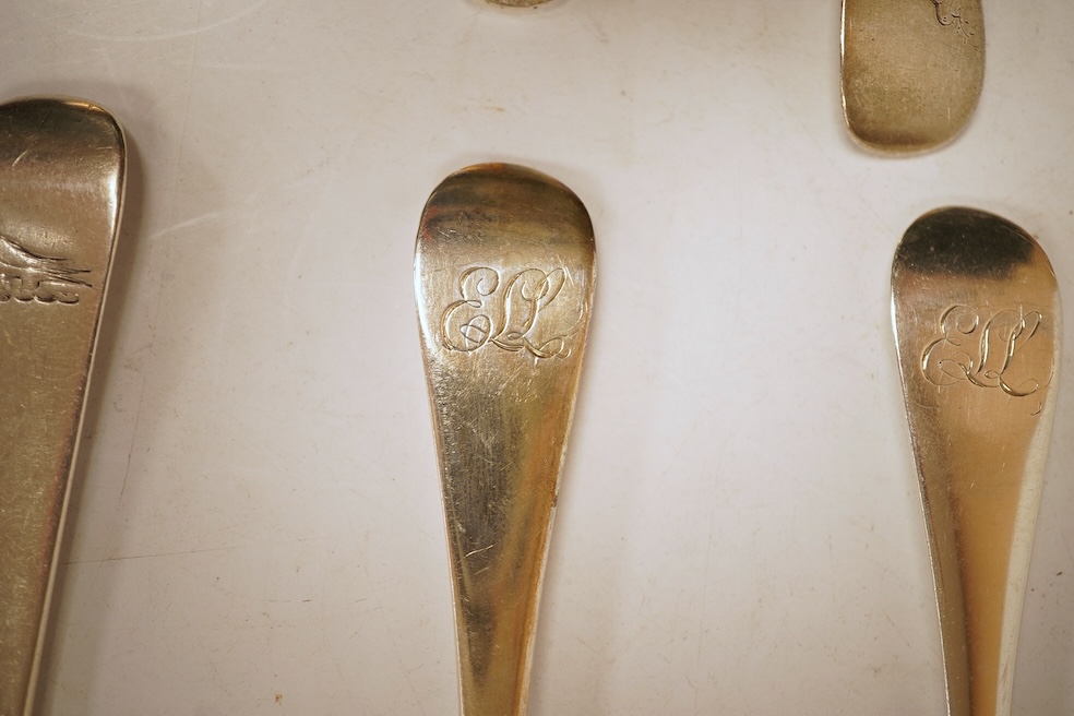 A matched set of seven Queen Anne silver Hanoverian pattern dessert spoons, maker's mark rubbed, five London, 1708, 17.5cm, together with seven other silver base mark Hanoverian pattern dessert spoons, various dates and